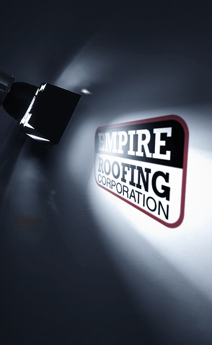 Empire Roofing logo under spotlight